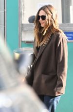 ELIZABETH OLSEN Arrives at JFK Airport in New York 10/16/2024