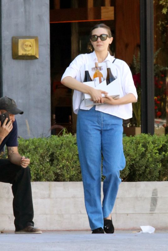 ELIZABETH OLSEN Shopping at a Natural Wine Store in Los Angeles 10/21/2024