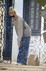 ERIKA JAYNE Grabs Some Take-out Delivery in Her Pajamas 10/13/2024