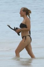 GILLIAN ANDERSON in Bikini at a Beach in Mexico, October 2024