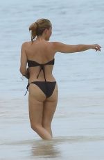 GILLIAN ANDERSON in Bikini at a Beach in Mexico, October 2024