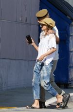 HALLE BERRY and Van Hunt Buying Halloween Decorations at Spirit of Halloween in Los Angeles 10/24/2024