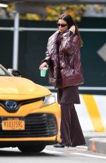 IRINA SHAYK Catches a Taxi Cab in New York City 10/28/2024