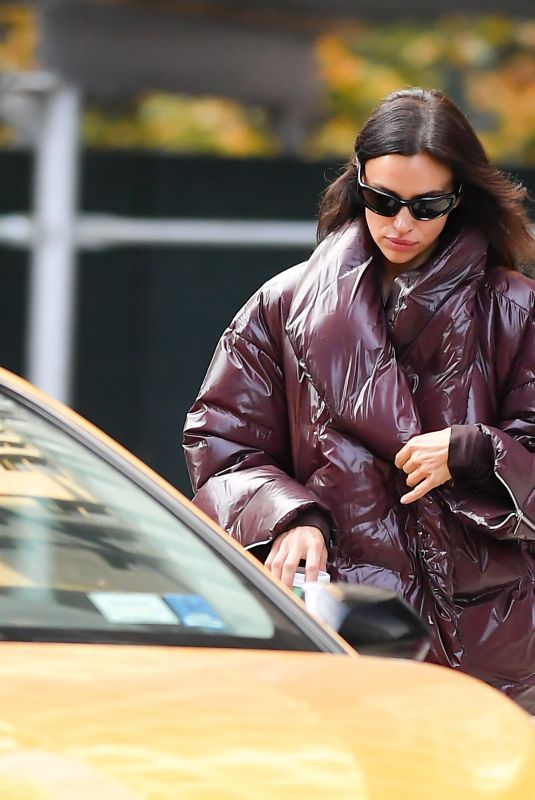 IRINA SHAYK Catches a Taxi Cab in New York City 10/28/2024
