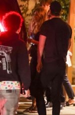 JENNIFER ANISTON Leaves Dinner with a Mystery Man and a Friend at Sunset Tower in West Hollywood 10/03/2024