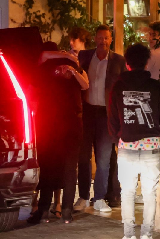 JENNIFER ANISTON Leaves Dinner with a Mystery Man and a Friend at Sunset Tower in West Hollywood 10/03/2024