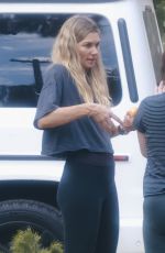 JESSICA HART Arrives at a Friend