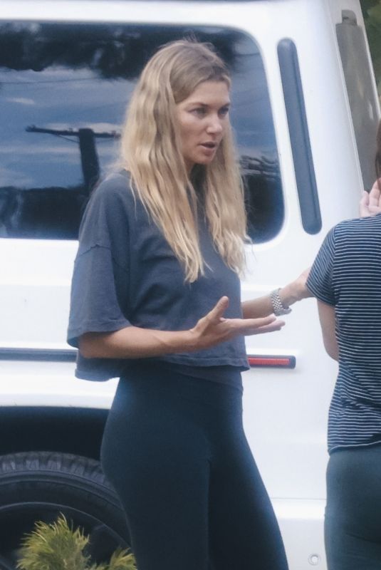 JESSICA HART Arrives at a Friend