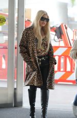 JESSICA SIMPSON Arrives at LAX Airport in Los Angeles 10/07/2024