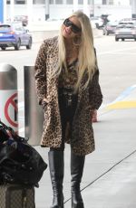 JESSICA SIMPSON Arrives at LAX Airport in Los Angeles 10/07/2024
