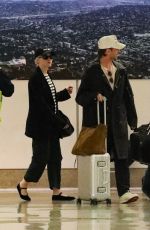 JULIA GARNER and Mark Foster Arrives at Burbank Airport in Los Angeles 10/05/2024