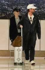 JULIA GARNER and Mark Foster Arrives at Burbank Airport in Los Angeles 10/05/2024