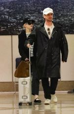 JULIA GARNER and Mark Foster Arrives at Burbank Airport in Los Angeles 10/05/2024