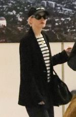 JULIA GARNER and Mark Foster Arrives at Burbank Airport in Los Angeles 10/05/2024