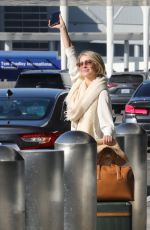 JULIANNE HOUGH Flagging Down Her Uber at LAX Airport in Los Angeles 10/24/2024