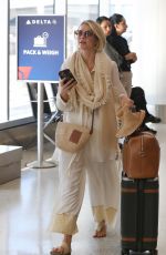 JULIANNE HOUGH Flagging Down Her Uber at LAX Airport in Los Angeles 10/24/2024