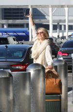 JULIANNE HOUGH Flagging Down Her Uber at LAX Airport in Los Angeles 10/24/2024