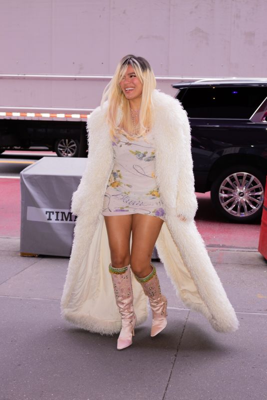 KAROL G Arrives at an Office Building in Times Square in New York 10/08/2024