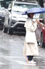 KATIE HOLMES Out on a Rainy Day in New York 09/29/2024