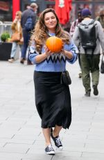 KELLY BROOK Leaves Heart Radio with a Pumpkin in London 10/31/2024
