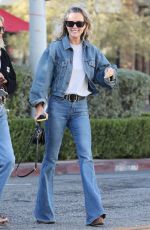 LAETICIA HALLYDAY in Double Denim Out with a Friend in Beverly Hills 10/21/2024