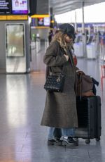 LILY JAMES Arrives at Airport in London 10/23/2024