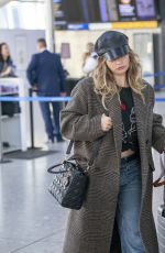 LILY JAMES Arrives at Airport in London 10/23/2024