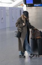 LILY JAMES Arrives at Airport in London 10/23/2024