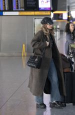 LILY JAMES Arrives at Airport in London 10/23/2024