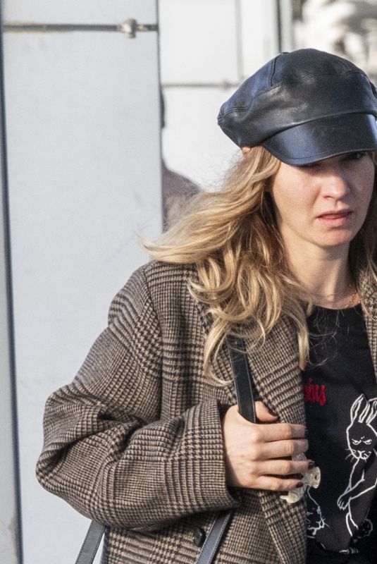 LILY JAMES Arrives at Airport in London 10/23/2024