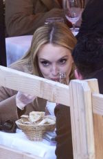 LINDSAY LOHAN on a Lunch Date with Her Husband Bader Shammas in Paris 10/01/2024