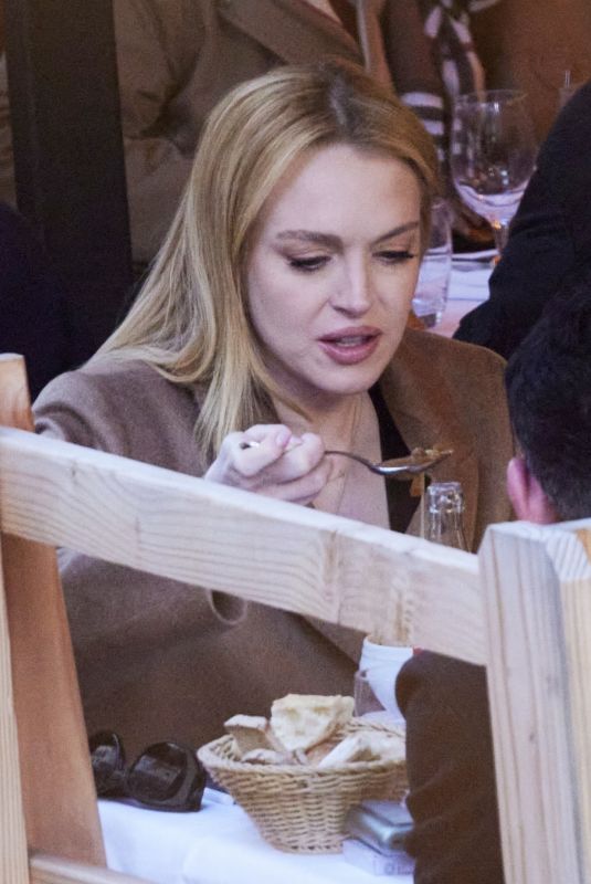 LINDSAY LOHAN on a Lunch Date with Her Husband Bader Shammas in Paris 10/01/2024