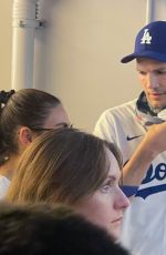 MILA KUNIS and Ashton Kutcher at Dodgers World Series Game in Los Angeles 10/25/2024