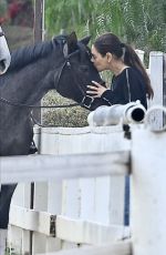 MILA KUNIS at a Horseback Riding in Los Angeles 10/27/2024