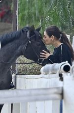 MILA KUNIS at a Horseback Riding in Los Angeles 10/27/2024