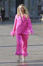 PERRIE EDWARDS in a Feather Trimmed Pink Pyjama Set Out in Manchester 10/08/2024