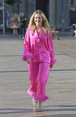 PERRIE EDWARDS in a Feather Trimmed Pink Pyjama Set Out in Manchester 10/08/2024