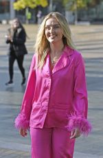 PERRIE EDWARDS in a Feather Trimmed Pink Pyjama Set Out in Manchester 10/08/2024