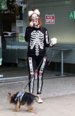 PHOEBE PRICE Out with Her Dog in Los Angeles 10/15/2024