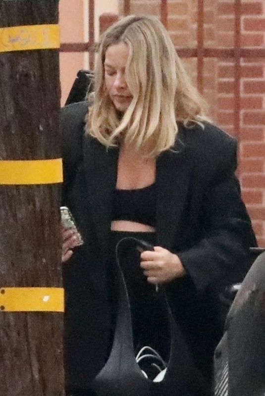 Pregnant MARGOT ROBBIE Arrives at an Office Building in Santa Monica 10/01/2024