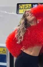 RITA ORA Strikes a Pose for Her Japanese Fans at a Train Platform, October 2024