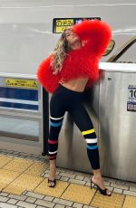 RITA ORA Strikes a Pose for Her Japanese Fans at a Train Platform, October 2024