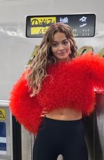 RITA ORA Strikes a Pose for Her Japanese Fans at a Train Platform, October 2024