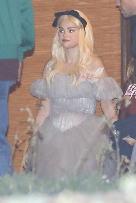 SELENA GOMEZ in Ruffled Tulle Dress and Blonde Wig Leaves Nobu in Malibu 10/26/2024