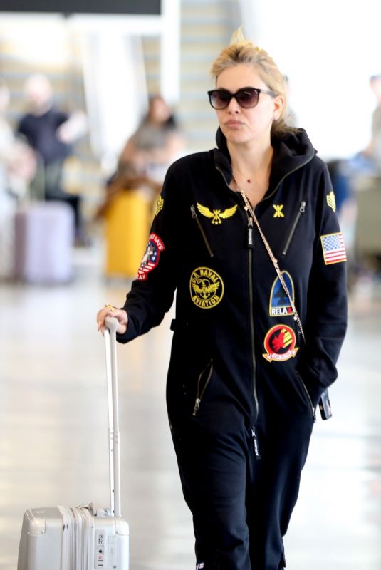 SHANNA MOAKLER Arrives at LAX Airport in Los Angeles 10/23/2024