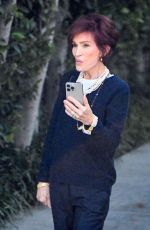 SHARON OSBOURNE FaceTimes with Someone on Her Way to Lunch in Beverly Hills 10/03/2024