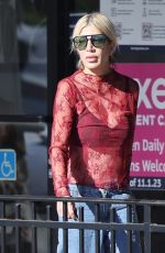 TORI SPELLING Shopping at Icon Golf Carts in Calabasas 10/23/2024