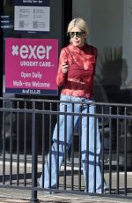TORI SPELLING Shopping at Icon Golf Carts in Calabasas 10/23/2024