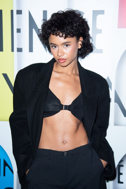 ZOE FOSTER at Uniqlo Lifewear Exhibition Cocktail in Paris 09/30/2024