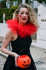 AMBER HEARD in a Quirky Clown Make-up and a Huge Red Ruff Collar Celebrates Halloween 10/31/2024